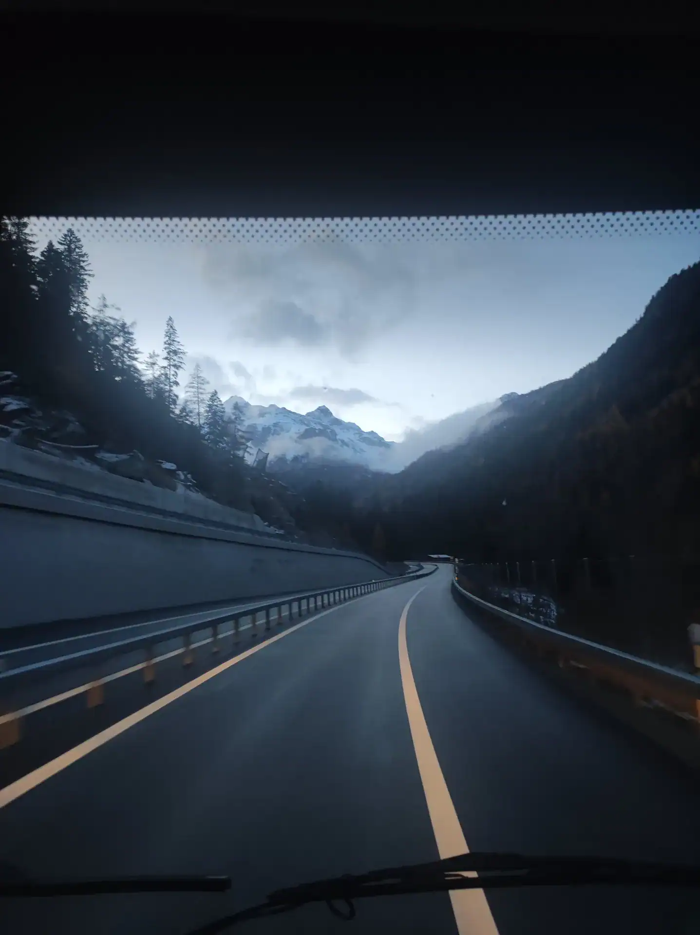 Archive of Writing Vagabond. Stories. Picture from the road through the mountains in Switzerland at night.